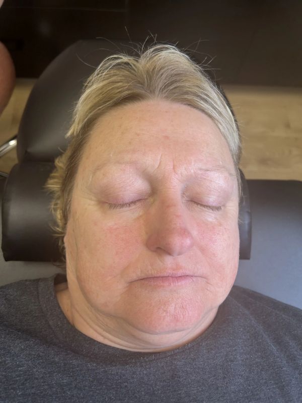 Before — Faded blonde brows redefined and tinted into a soft, natural frame.