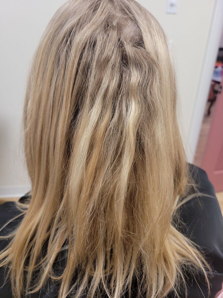 Before — Faded, grown-out blonde refreshed with dimensional highlights and a soft, bouncy blowout.