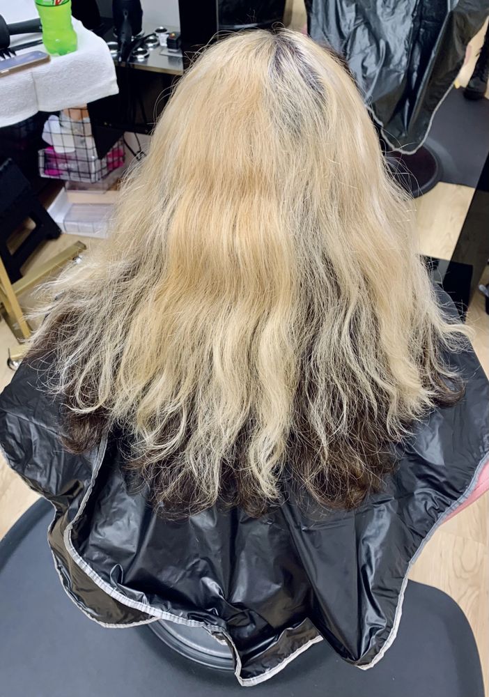 Before — Dry, frizzy blonde lengths transformed into smooth, sleek shine with a smoothing treatment.