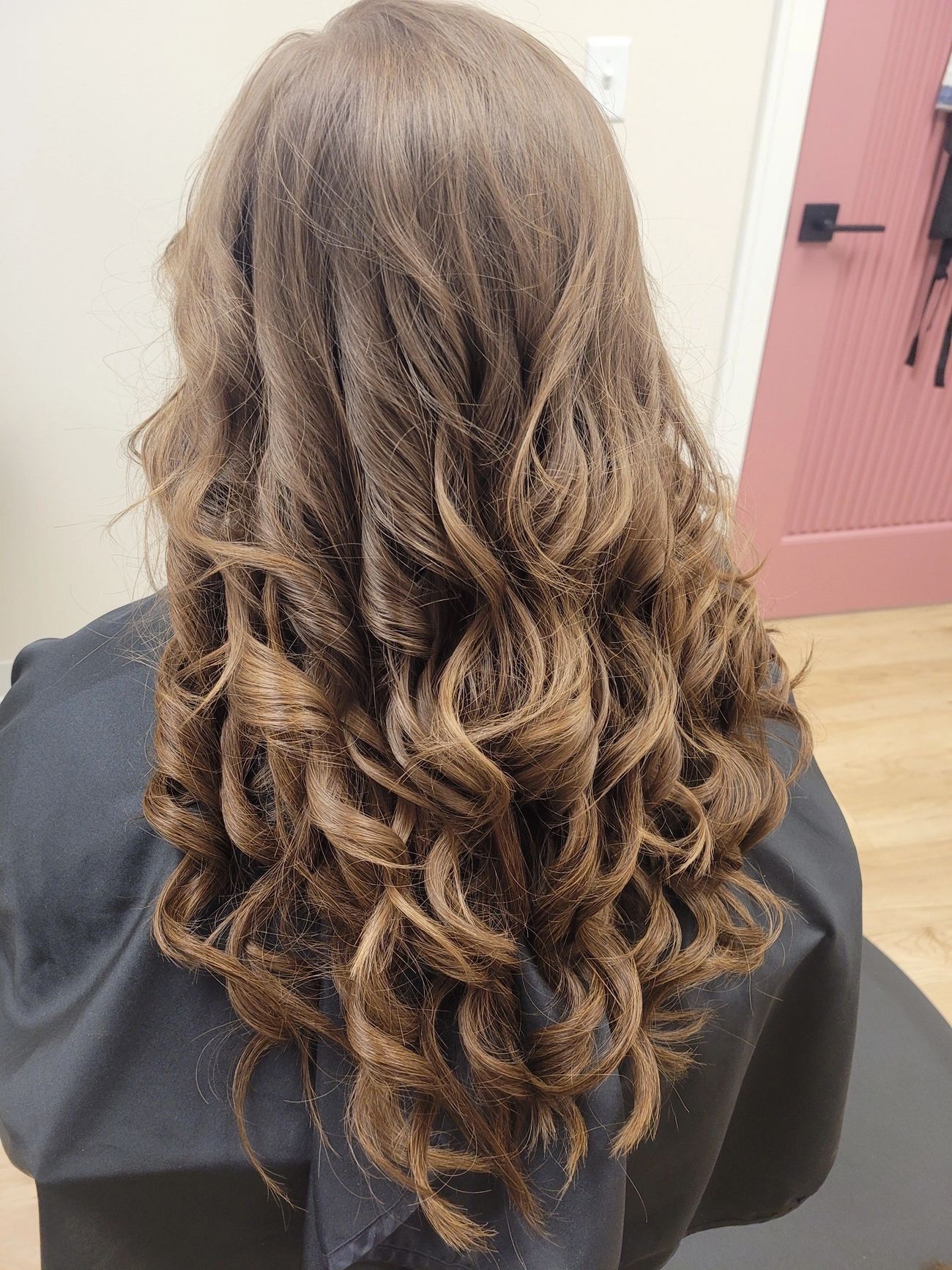 After — Fine, thinning hair transformed with bouncy, full-bodied curls.